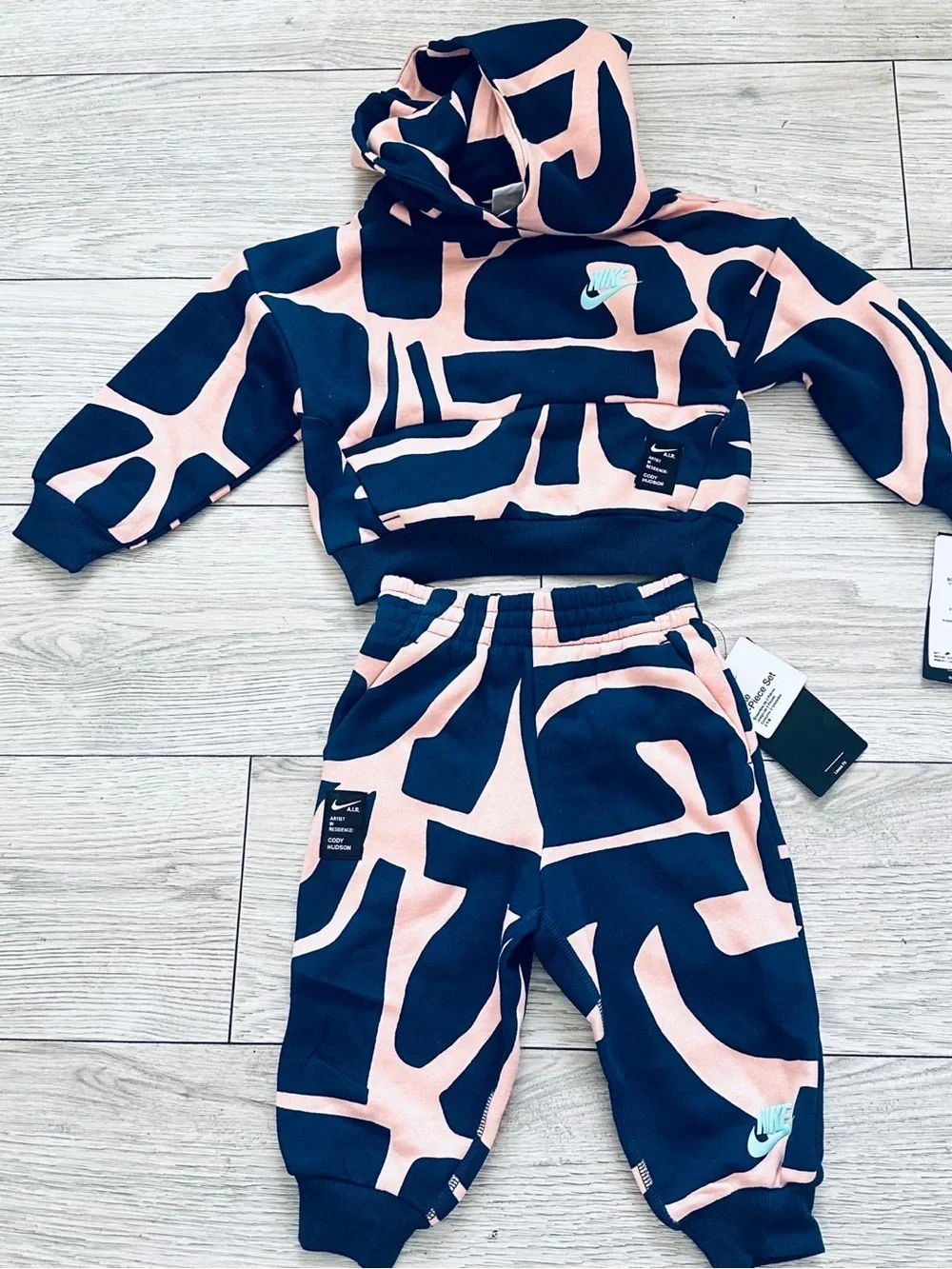 Nike Kids Abstract Print Sweatpants in Pink and Navy size T3